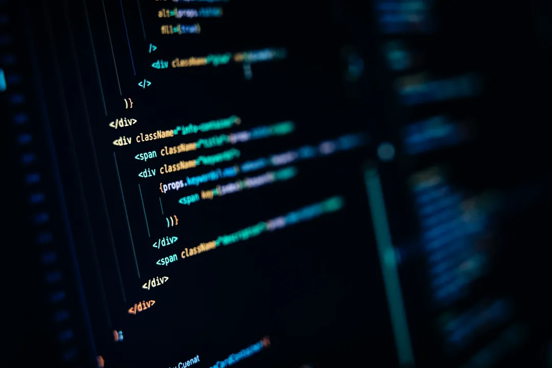 Close-up editorial photograph of a software code editor