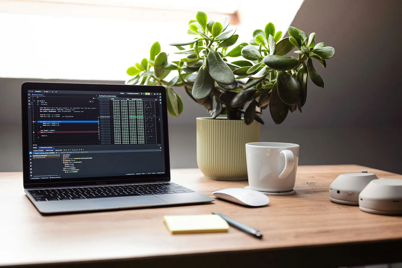 Illustrative developer workbench with a laptop